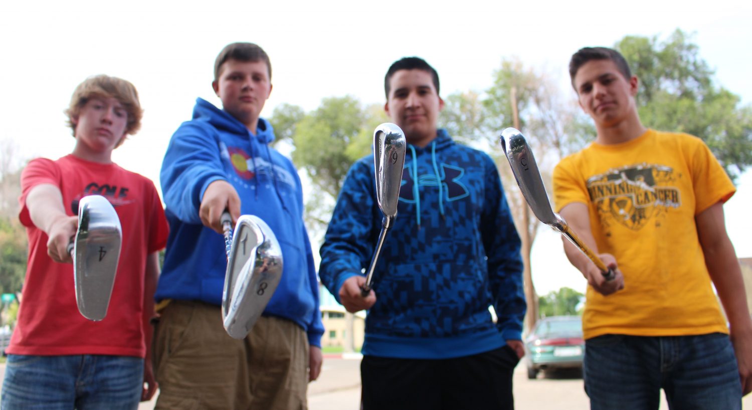 Peter Grossenbacher,  Andy Geisick, Ethan Alcazar, and J.D. Truax get serious about state golf, which begins this week. (Cameron Moser)