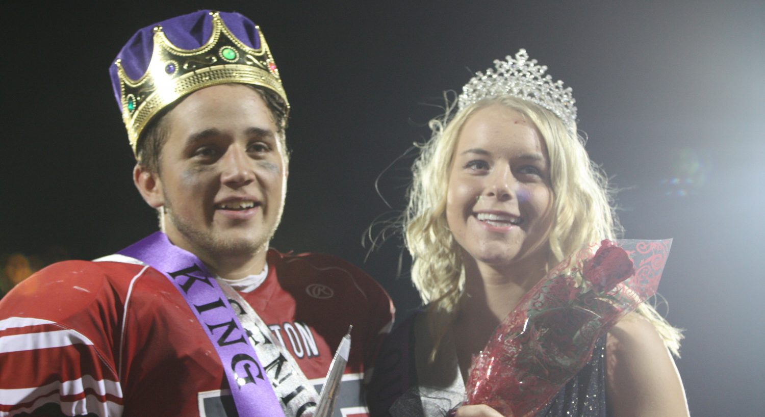 Lucas Halferty and Caiden Rexius smile as they celebrate their homecoming coronation. (Photo by 
