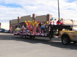 The Eaton High School Junior Class sports their carnival themed float in the parade.