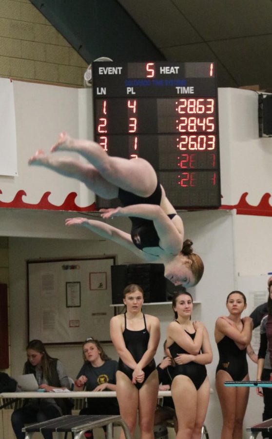 Eatons+Emily+Anderson+performs+a+flip+in+mid-air+during+the+diving+portion+of+the+meet.