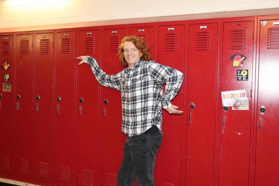 CJ Blaskowski (19) dances down the halls in his plaid black and white flannel, drawing the eye to his best accessory; his fiery red hair.