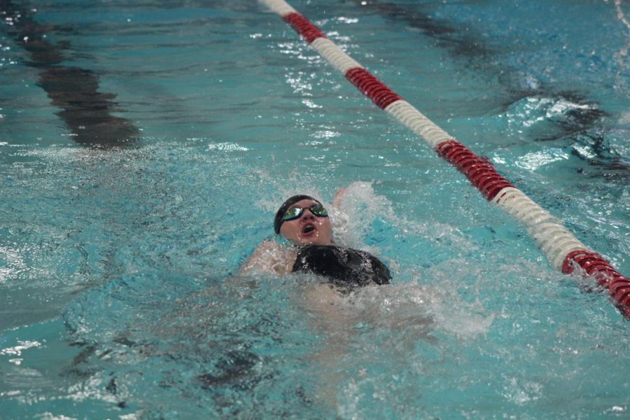 Molly Koslosky shoots across the pool during her portion of the relay. 
