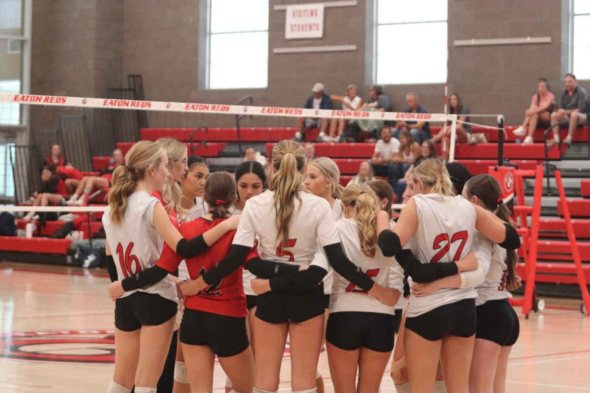 C team huddles in scrimmage against Loveland 