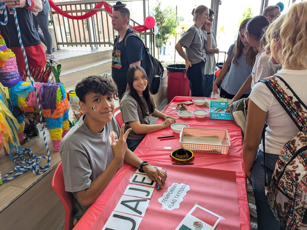 Omar Rodriguez poses for a photo during the Latin Fiesta at EHS