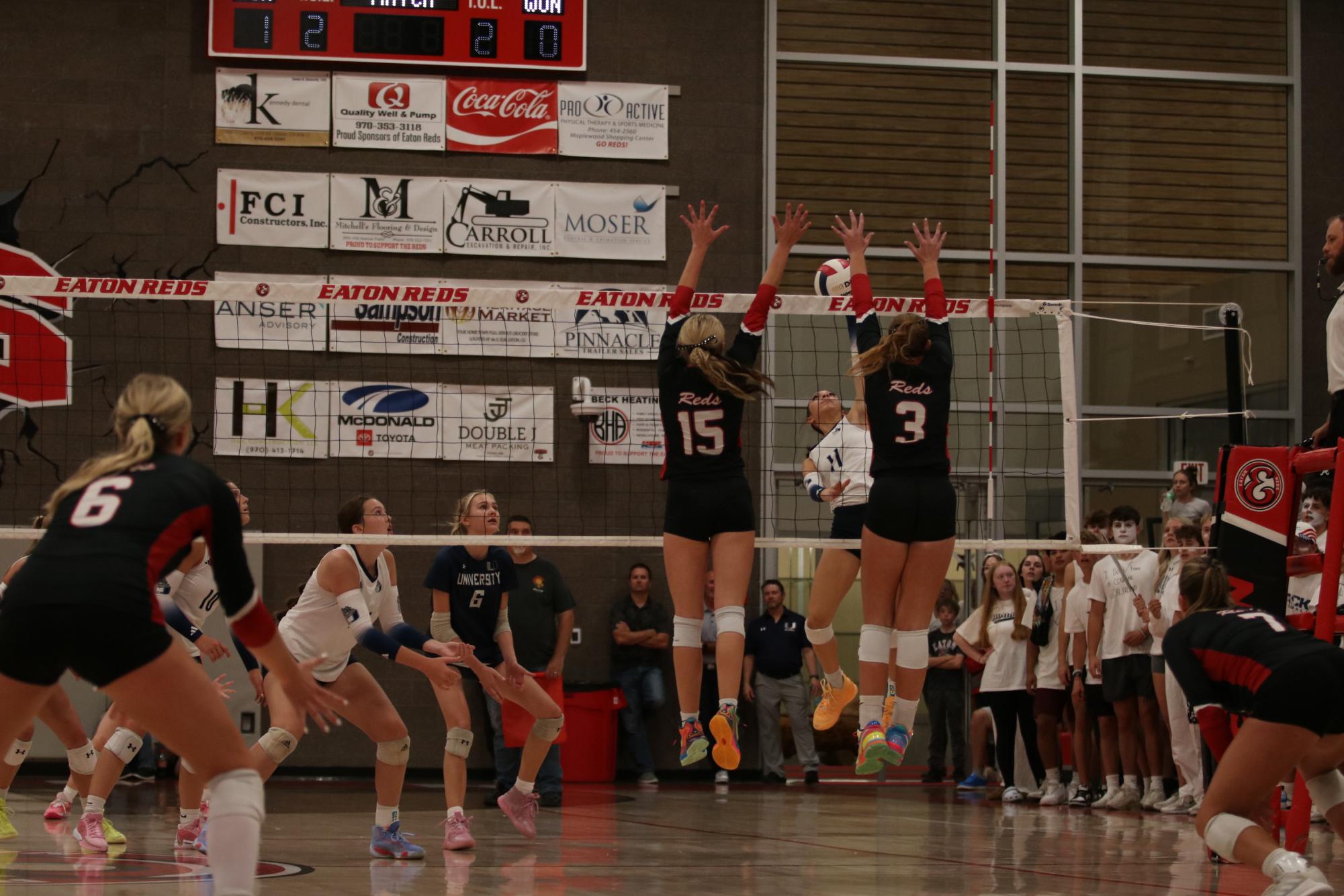 Eaton high school volleyball battles rival team University high school