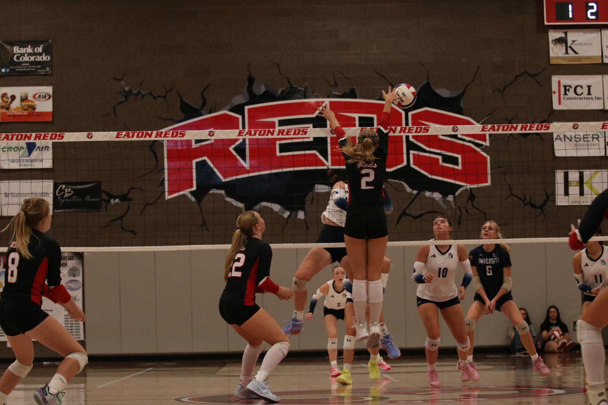 Eaton high school volleyball battles rival team University high school