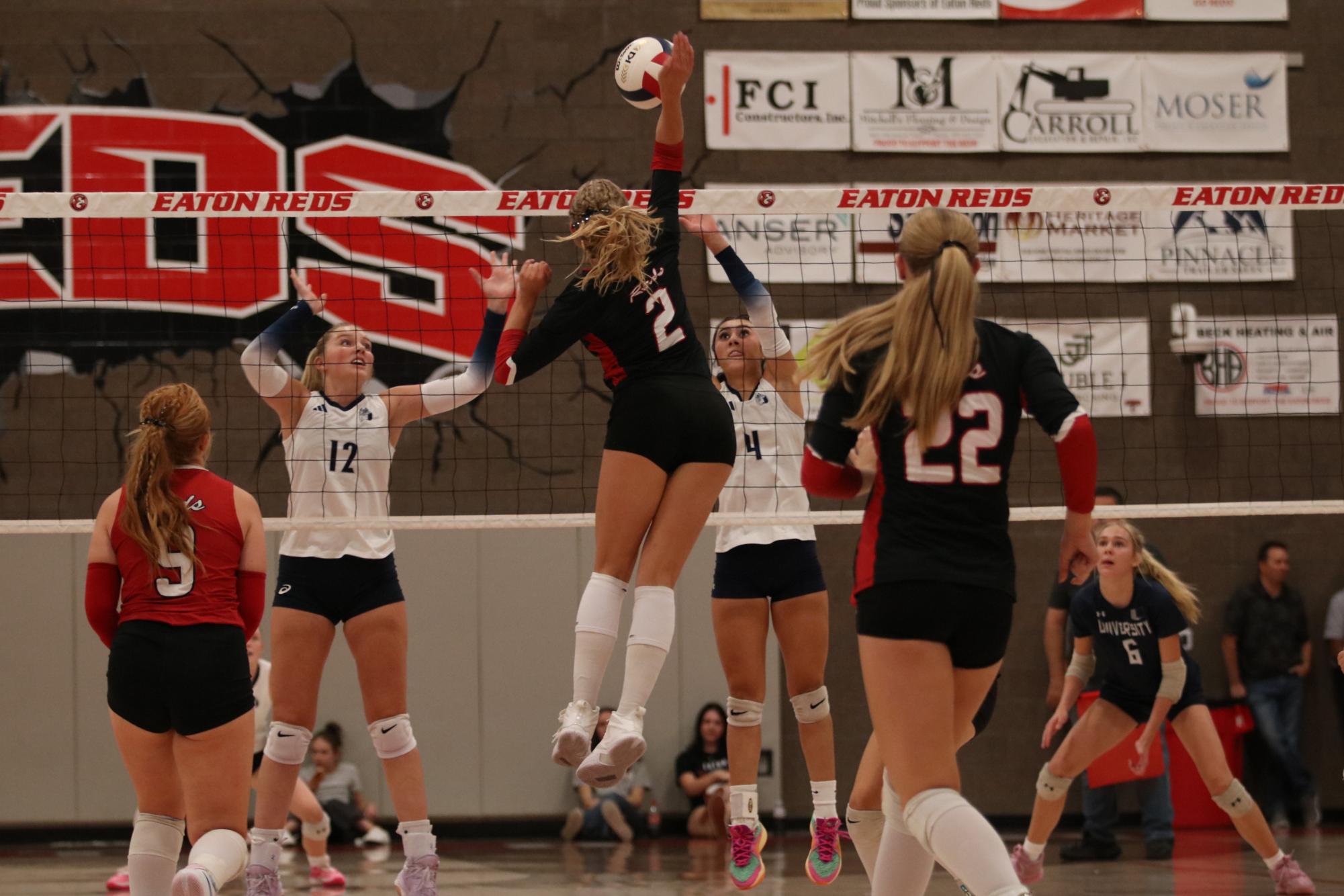 Eaton high school volleyball battles rival team University high school