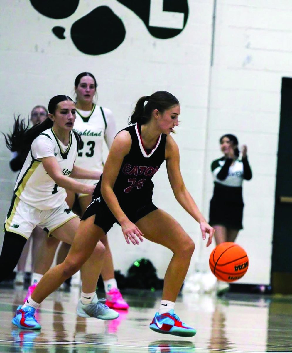  Courtney Steinkamp (27) drives to the basket during a tough matchup
